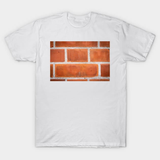 Red brick background clloseup pattern with white grout lines. T-Shirt by brians101